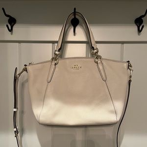 Coach bag with adjustable crossbody strap. Off white/cream color.